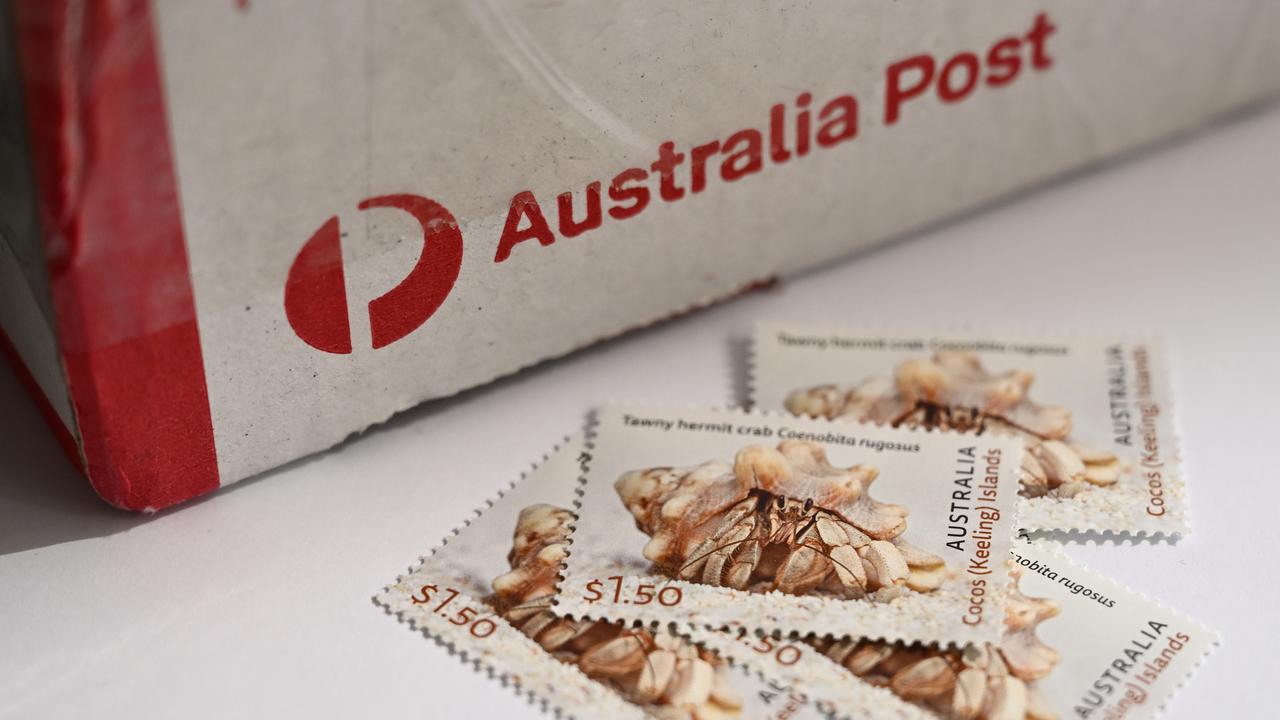 Australian Post stamps alongside a parcel box