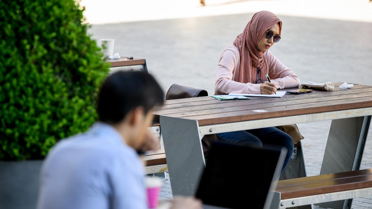 Students are seen studying at the University of Sydney,